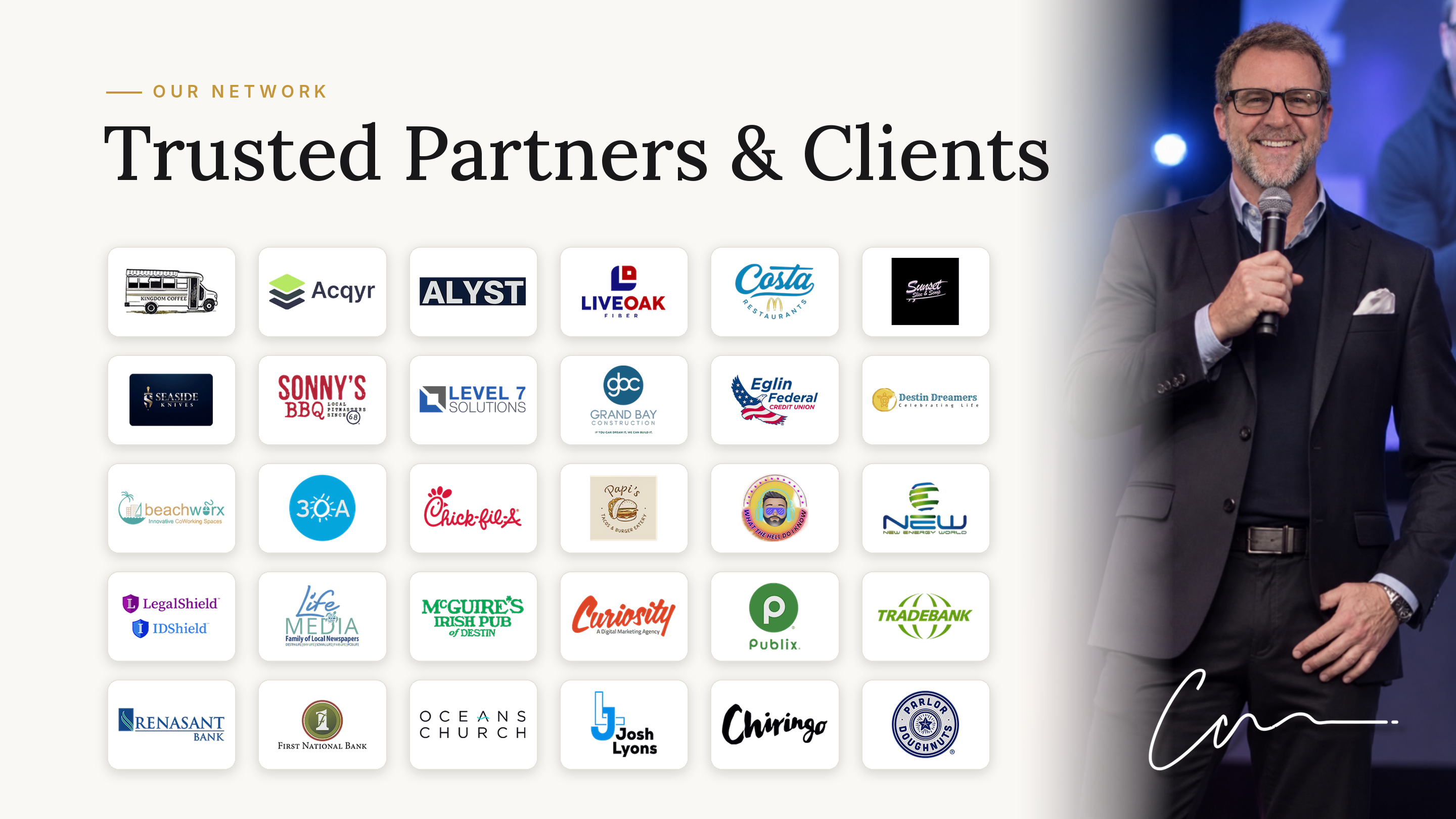 Christopher Coach Cumby onstage alongside trusted partners and clients across business and community, including Publix, Chick-fil-A, Eglin Federal Credit Union, and local organizations